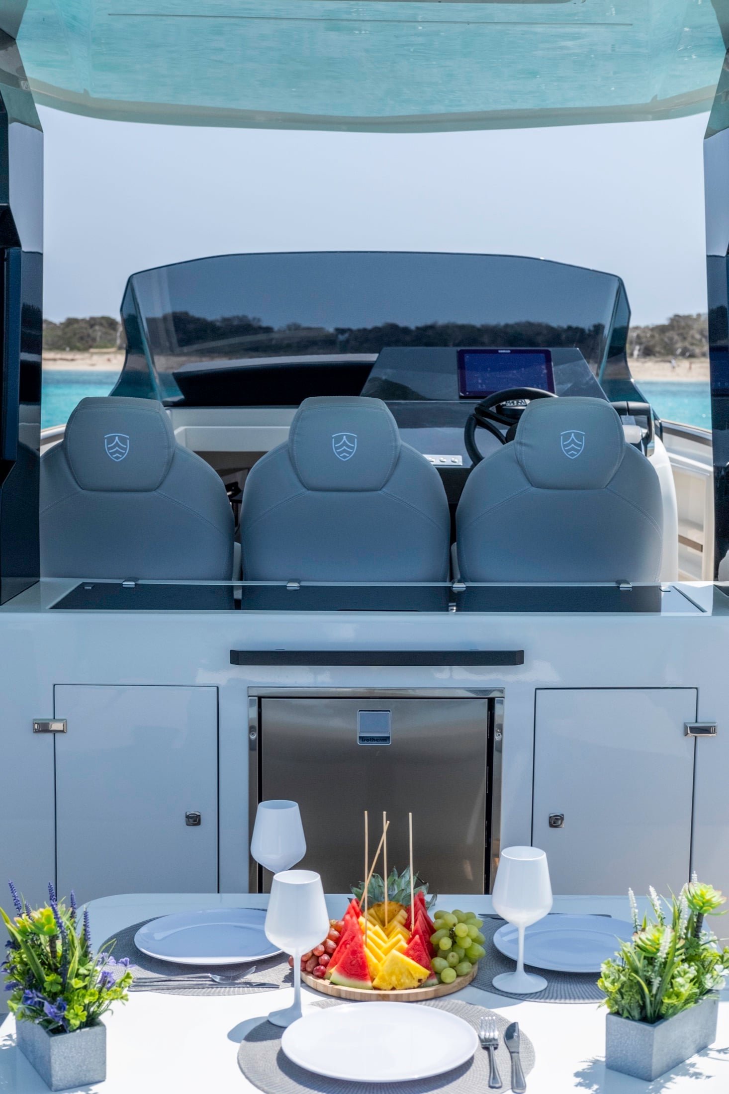 Three helm seats and navigation console on the Kumbra 34