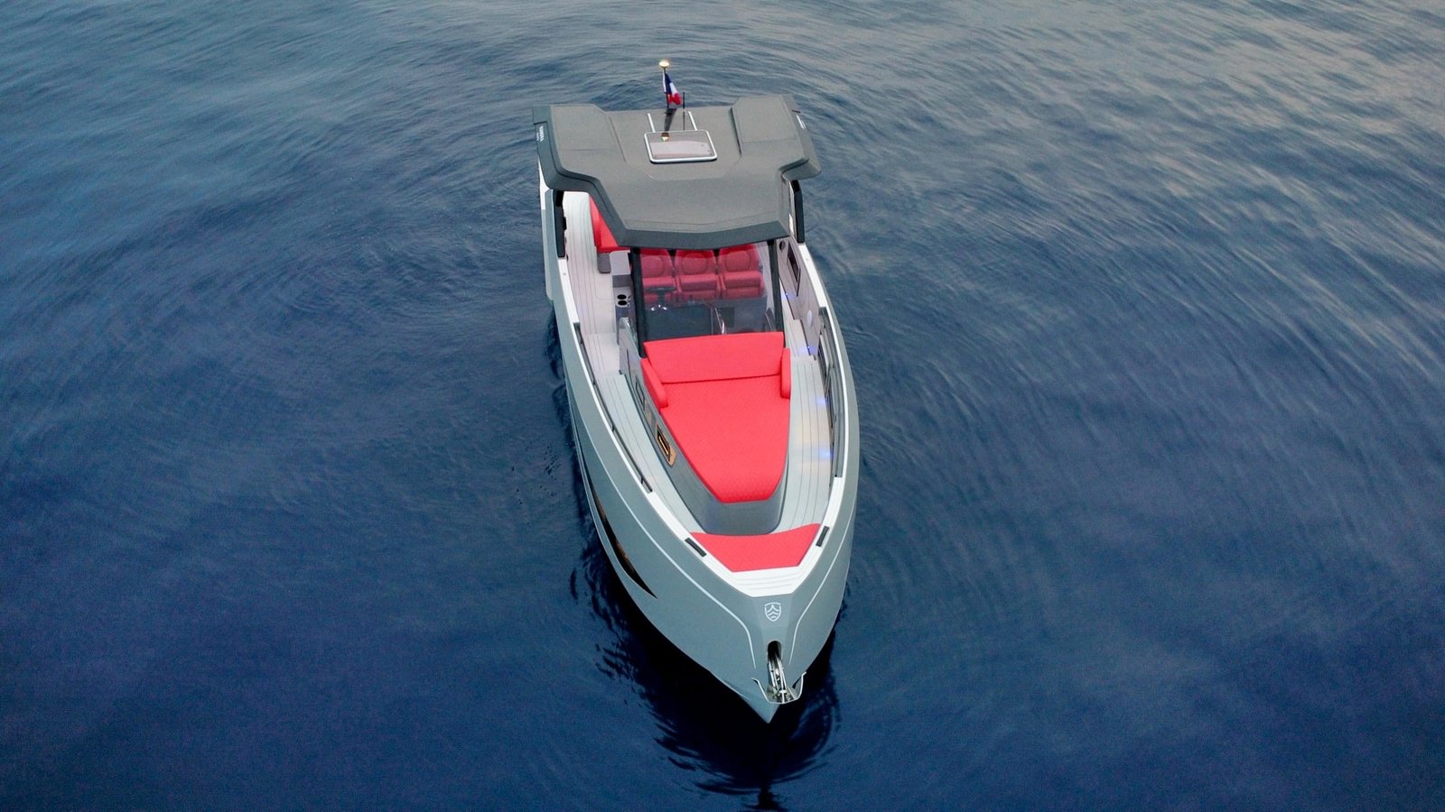 Aerial bow view of the Kumbra 36 and its red forward sunbed