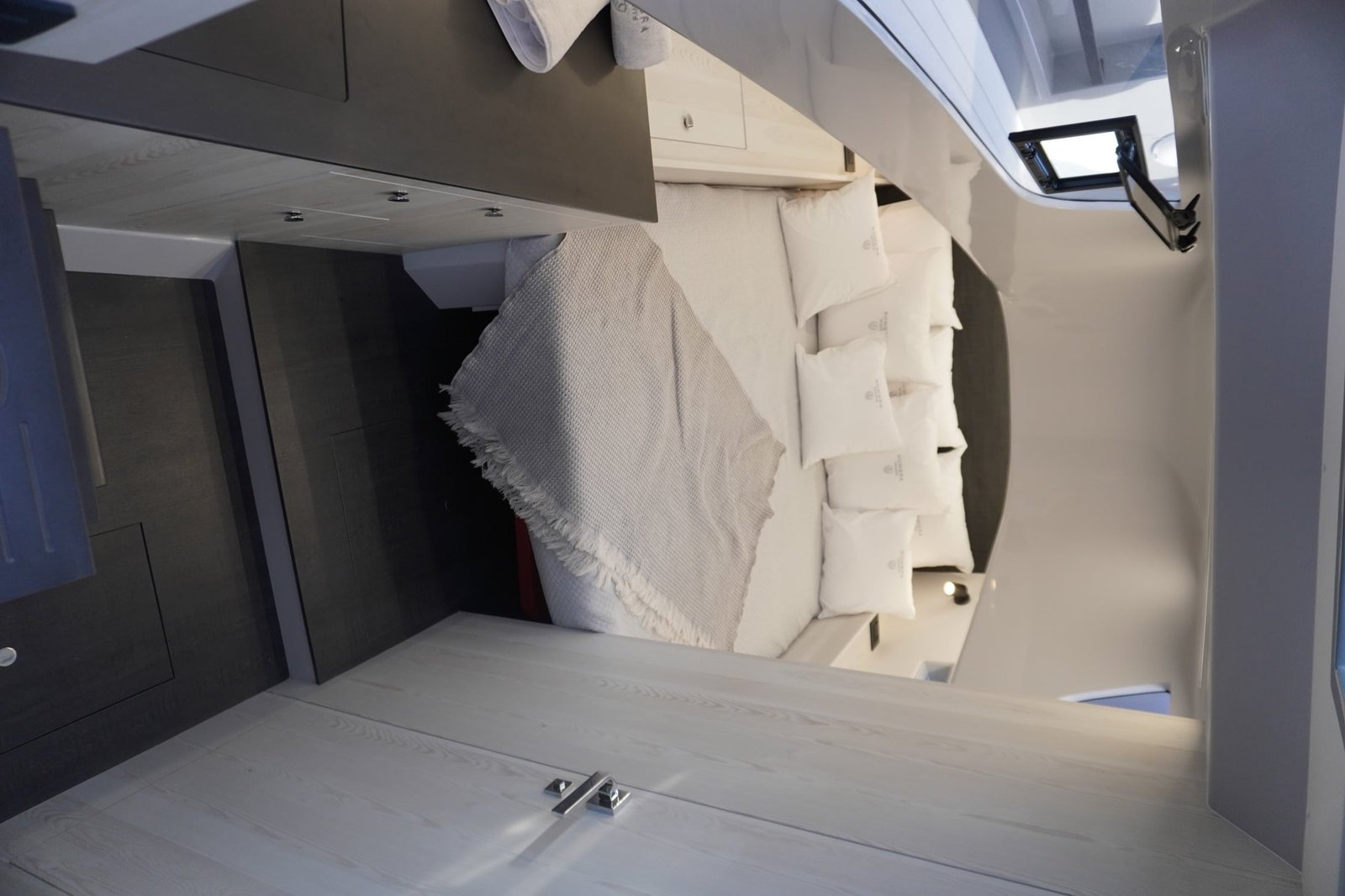 Kumbra 36 main cabin with double berth and light wood cabinetry
